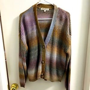 Multi-colored long sleeve, button up sweater. Perfect for cool evenings.